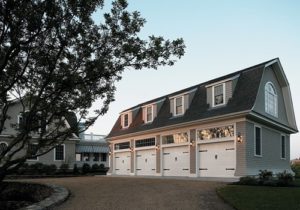 A large four-car garage beside a home